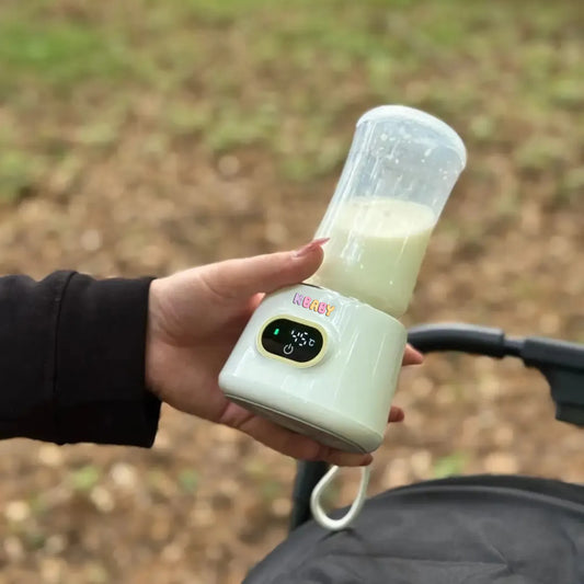 Chauffe-biberon portable K-BABY utilisé en extérieur, maintien du lait maternel à 45°C, pratique pour promenade avec poussette
